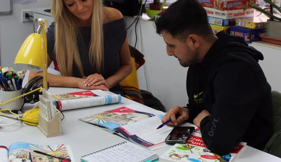 English teacher leading a class at Yorkshire College in Leeds